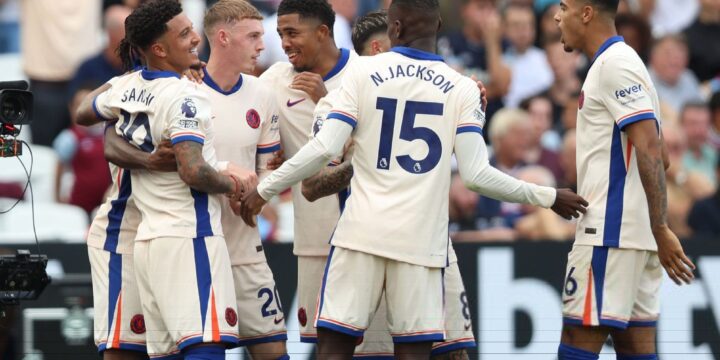 Chelsea players celebrating a goal against Wolves in the Premier League